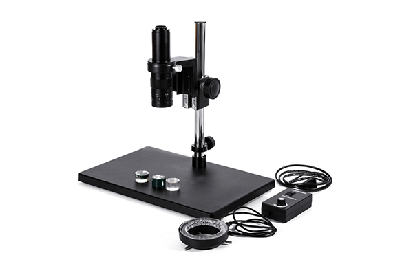 What is the difference in observation experience between a monocular video microscope and a binocular microscope?